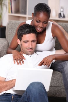 mixed couple surfing the net