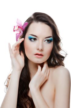 The beauty portrairt of woman with flower on head.