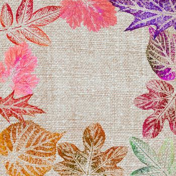 Abstract artistic background, hand draw, various painted colored leaves on a linen canvas