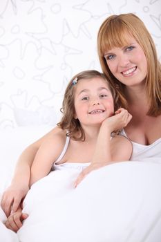 Mother posing with her daughter