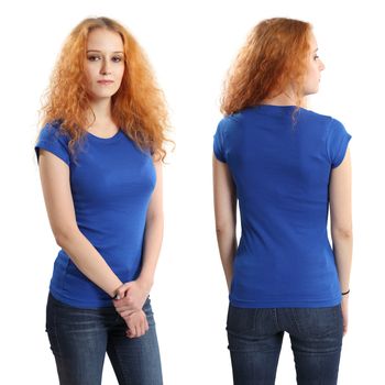 Young beautiful redhead female with blank blue shirt, front and back. Ready for your design or artwork.