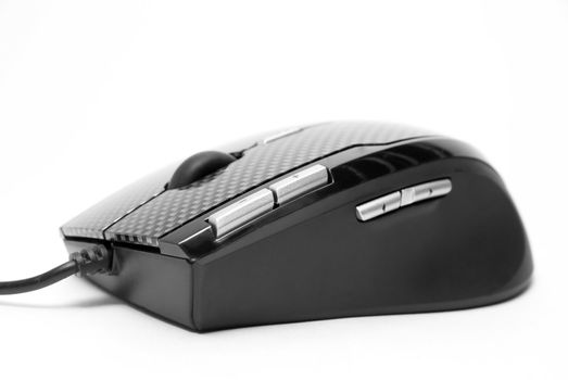 Modern PC mouse with cable isolated on white background.