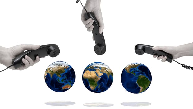 World Communication on white. office black telephones with hands connecting to world