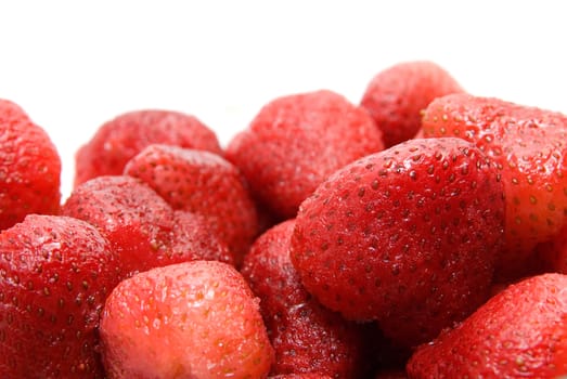 Close-up of ripe strawberry on white background
