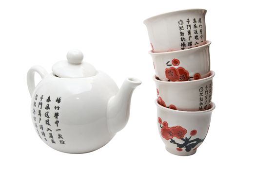 Tea-things in asian style with hieroglyphics. Isolated on white.