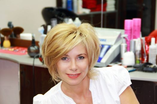 Portrait of pretty woman with blond hair