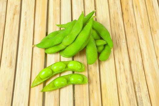 green bean vegetable on wood background