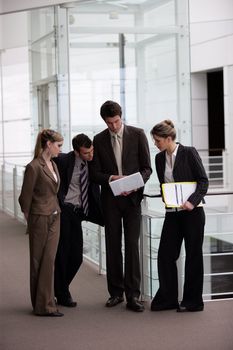 Business group gathered in the corridor