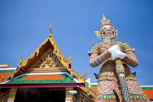 Guardian of temple with blue sky in Thailand