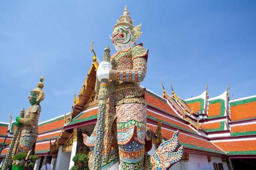 Guardian of temple with blue sky in Thailand