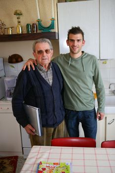 Father and son in the kitchen