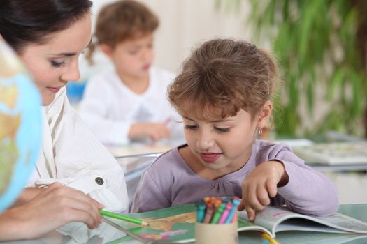 Teacher with a little girl