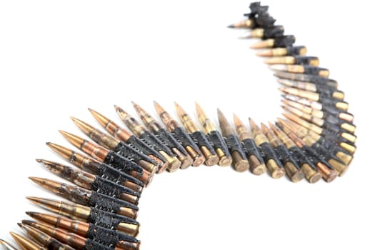 Machine-gun tape with cartridges of times  Second World War on a white background