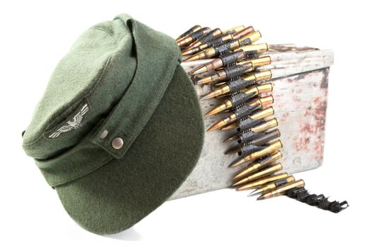 Kepi of the German soldier and machine-gun tape on a white background