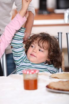 happy family celebrating and eating pancakes