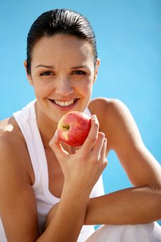 Woman eating an apple