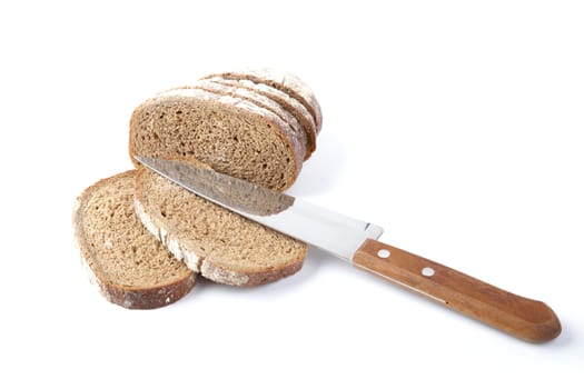 Chunks of the cut bread on a white background