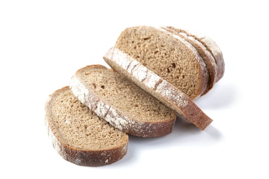Chunks of the cut bread on a white background