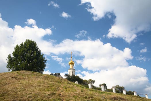 Orthodox church against the sky with clouds