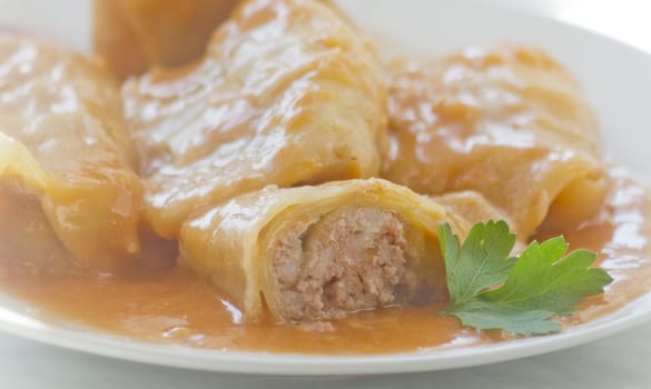 cabbage rolls, Polish dish made ​​of minced cabbage and rice, respectively, seasoned and stewed in tomato sauce