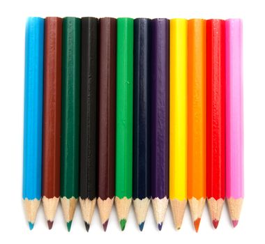 Colour pencils isolated on white background close up 