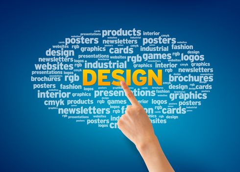Hand pointing at a Design Word Cloud on blue background.