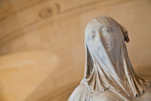 Lady with a veil: classical example of funeral art