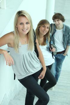 portrait of 3 teenagers in stairs