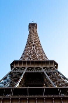 The universal landmark of Paris on a clean, blue background