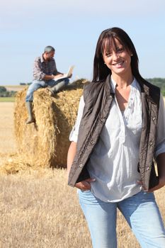 happy couple in their farm