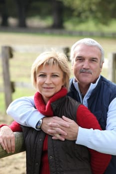 Mature couple outdoors in the autumn