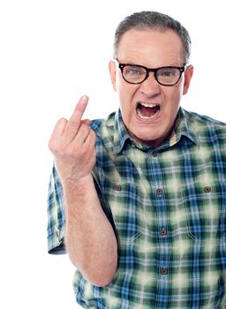 Image of a displeased man showing middle finger. Isolated against white