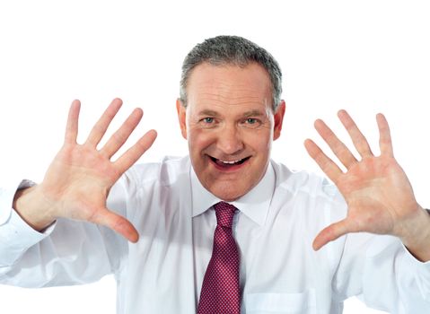Excited businessman showing his palms to camera