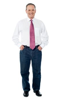 Businessman full length portrait. Hands in pocket