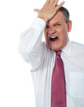 Cropped image of a disturbed businessman with  hand on his head