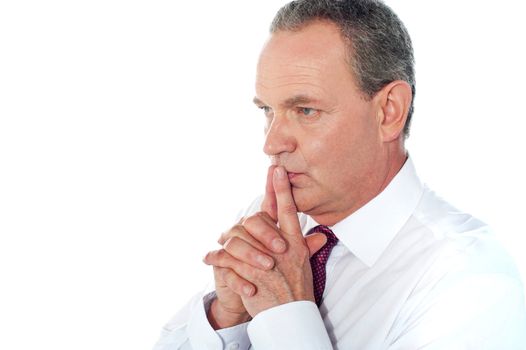 Portrait of thoughtful businessman isolated on white