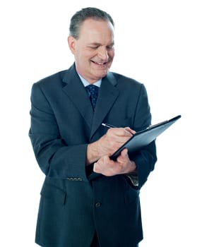 Elder confident man making business notes. Isolated on white