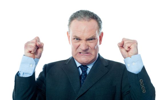 Frustrated senior businessman on white background