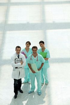 medical foursome posing outdoors