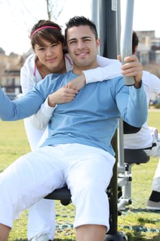 girl and boy doing exercises outdoors