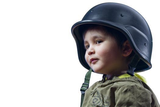 Baby playing war with military helmet