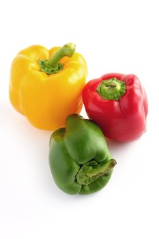 Red, green and yellow peppers