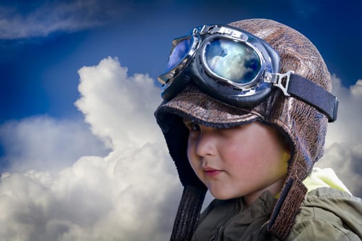 Child pilot, cute and funny over background clouds