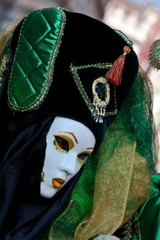 One woman with carnival mask in Venice