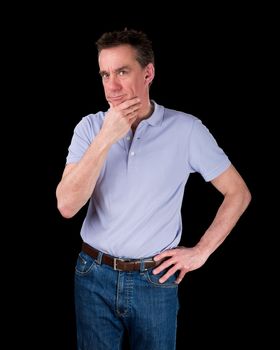 Thoughtful Middle Age Man Considering Something Hand on Hip Black Background