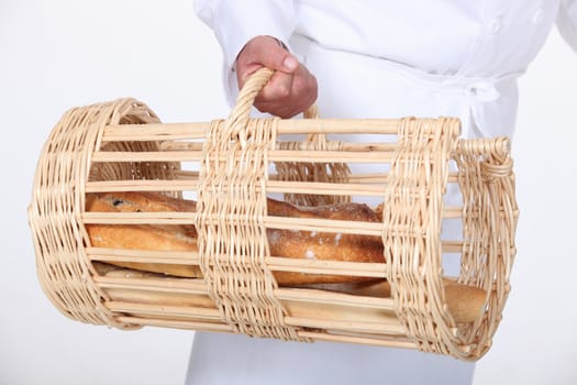 Baker with a basket of bread