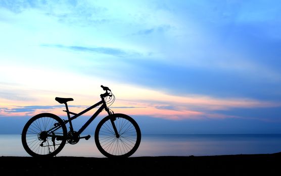 Silhouette of a Bike on the Beach