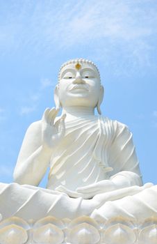 white  buddha image with blue sky   , northeast of  Thailand
