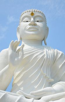 white buddha image with blue sky   , northeast of  Thailand
