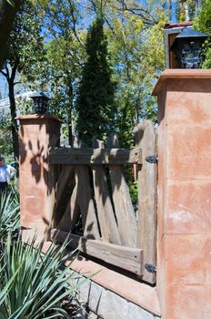 Nice wooden fence in the sunny garden